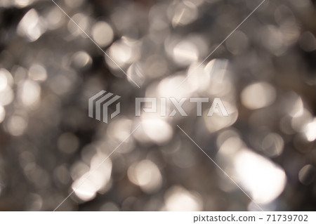 Abstract blurred gold background with beautiful bokeh effect. Abstract blurred gold background with beautiful bokeh effect. 71739702
