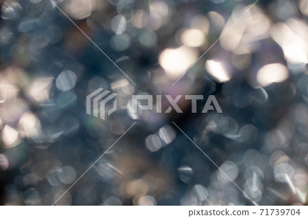 Abstract blurred gold background with beautiful bokeh effect. Abstract blurred gold background with beautiful bokeh effect. 71739704