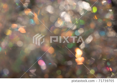 Abstract blurred gold background with beautiful bokeh effect. Abstract blurred gold background with beautiful bokeh effect. 71739705