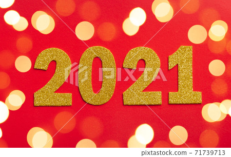 Happy New year 2021 celebration. Gold numeral 2021 and lights. Happy New year 2021 celebration. Gold numeral 2021 and lights. 71739713