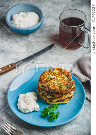 Zucchini parmesan pancakes with dip Zucchini parmesan pancakes with dip 71741527