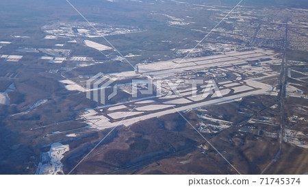 New Chitose Airport where the runway emerges in the snow New Chitose Airport where the runway emerges in the snow 71745374