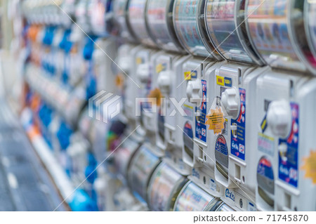 Capsule toys lined up on the streets of Akihabara, Tokyo 71745870