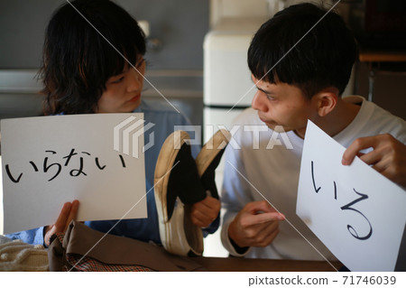 A couple organizing things A couple organizing things 71746039