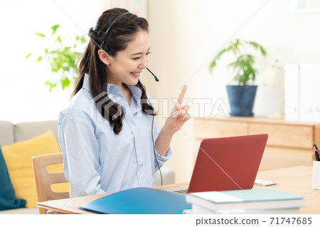 Woman making a video call 71747685