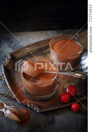 Two portions of chocolate mousse, cocoa powder dressing Two portions of chocolate mousse, cocoa powder dressing 71753913