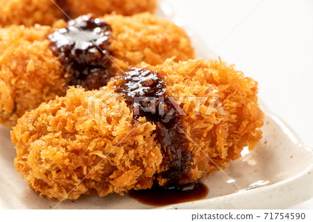 Up fried oysters. (White background) Up fried oysters. (White background) 71754590