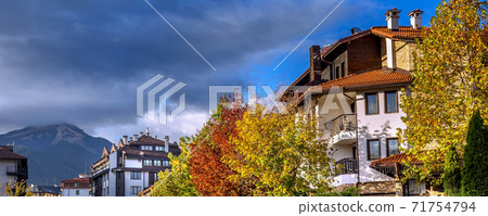 Bansko, Bulgaria autumn banner with mountain view Bansko, Bulgaria autumn banner with mountain view 71754794