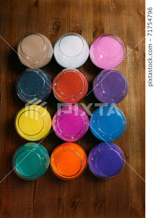 ollection of decorative candles on a rustic antique wooden background ollection of decorative candles on a rustic antique wooden background 71754796