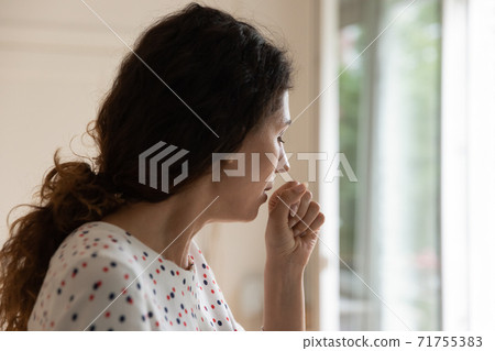 Unwell woman cough suffering from flu symptoms 71755383