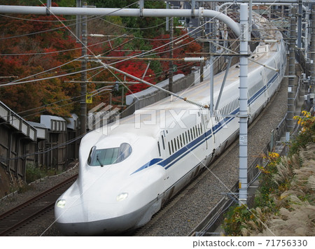 Shinkansen N700S J1 formation and autumn leaves near Ishiyama, Otsu City 71756330