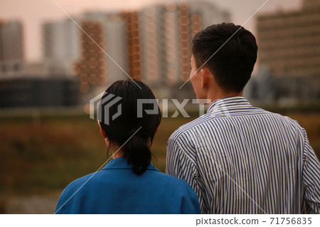 A couple looking at the apartment A couple looking at the apartment 71756835