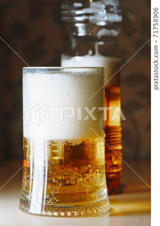 beer in the store is poured into a plastic bottle beer in the store is poured into a plastic bottle 71758906
