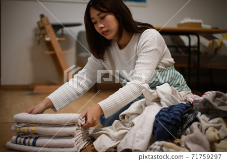 A woman tired of housework 71759297