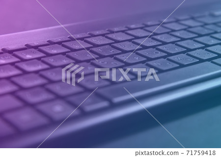 Laptop keys are tinted blue. Laptop keyboard tinted blue Laptop keys are tinted blue. Laptop keyboard tinted blue 71759418