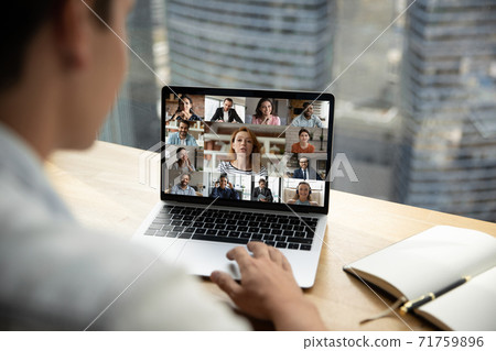 Happy multiracial young people communicating online distantly. 71759896