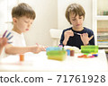 Kid Painting at Kindergarten 71761928