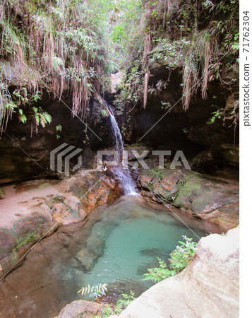 Flowing water and natural pool in the Isalo National Park in Madagascar Flowing water and natural pool in the Isalo National Park in Madagascar 71762304