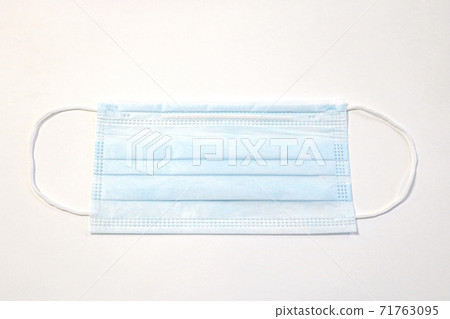 Protective coronavirus face mask mock-up isolated on white background. 71763095