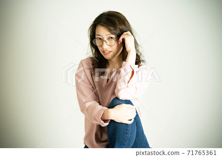 Image of a woman who values herself in a natural way Image of a woman who values herself in a natural way 71765361