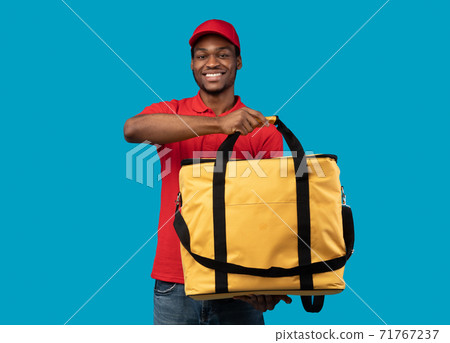 African american delivery man posing with thermo bag African american delivery man posing with thermo bag 71767237