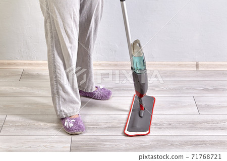 Spraying flat mop with microfiber head is used for wet mopping. 71768721