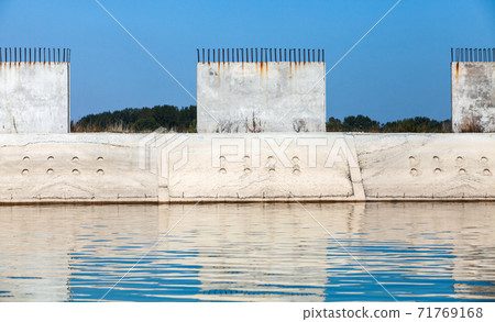 Coastal fortifications made of concrete blocks 71769168