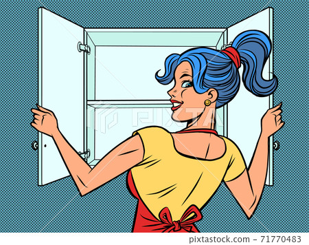 A woman opens the cupboard 71770483