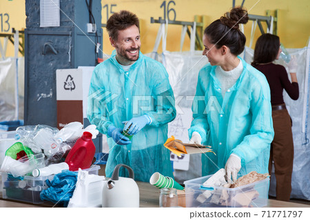 Woman telling something to her collaborator Woman telling something to her collaborator 71771797