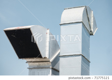 Duct Blower for Air Ventilation Smoke Exhaust Over Roofing of Shopping Mall, Air Ventilations Equipment and Flowing System. Exhausting Air Suction 71775121