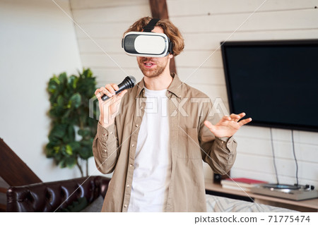Man singing along to favorite song 71775474