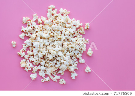 Popcorn on pink background. Copy space Popcorn on pink background. Copy space 71776509