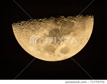 half moon in the dark sky 71779750