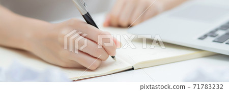 Closeup hand of young asian woman work and writing for planning on notebook on table. Closeup hand of young asian woman work and writing for planning on notebook on table. 71783232