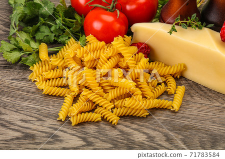Italian pasta - raw Girandole for cooking Italian pasta - raw Girandole for cooking 71783584