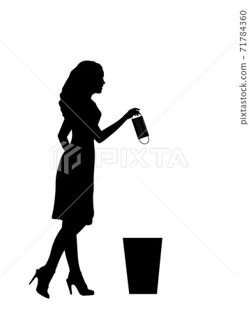 Silhouette of woman throws medical mask into trash 71784360