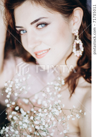 Romantic portrait of a young girl with blue eyes Romantic portrait of a young girl with blue eyes 71785011