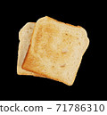 Slices of bread toast isolated on black background 71786310