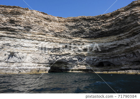 Grotto on the Bank of the Tarkhankut national nature Park in the village of Olenevka 71790384
