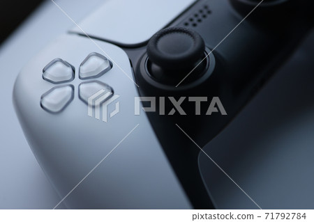 White modern game pad closeup background 71792784