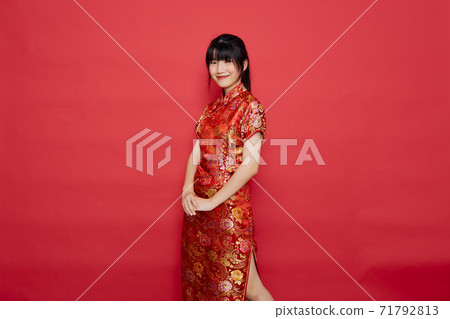 Asian woman wear Chinese dress with action Asian woman wear Chinese dress with action 71792813