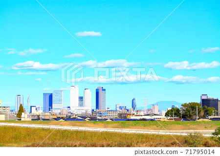 Scenery of the skyscraper county in front of Nagoya Station as seen from the riverbed of the Shonai River in Nagoya City Scenery of the skyscraper county in front of Nagoya Station as seen from the riverbed of the Shonai River in Nagoya City 71795014