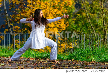 Positions of arms and hands of yoga practiced in the park Positions of arms and hands of yoga practiced in the park 71797984