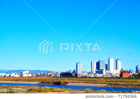 Scenery of the skyscraper county in front of Nagoya Station as seen from the riverbed of the Shonai River in Nagoya City Scenery of the skyscraper county in front of Nagoya Station as seen from the riverbed of the Shonai River in Nagoya City 71798366