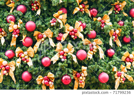 Decorated Christmas tree with fir tree on bakeh background. Merry Christmas and New Year holidays background with copy space for your text 71799236