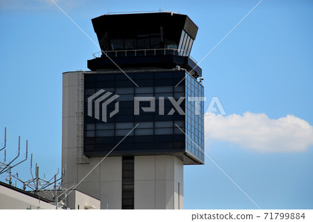 Control tower at Itami Airport (Osaka International Airport) that shines in the blue sky Control tower at Itami Airport (Osaka International Airport) that shines in the blue sky 71799884