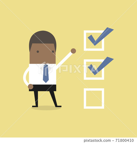 African businessman with important checklist. African businessman with important checklist. 71800410