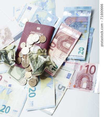 Cash on table isolated: dollars, euro, rubl broken money. All in mess, global crisis . passport travel concept Cash on table isolated: dollars, euro, rubl broken money. All in mess, global crisis . passport travel concept 71800666