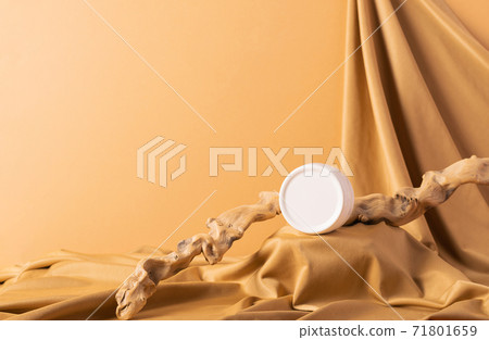 Cosmetics cream jar modern abstract podium trendy yellow background draped cloth 71801659