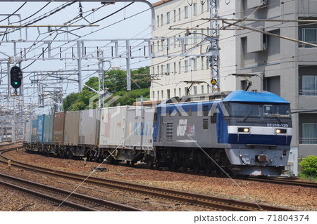 EF210 towed up freight train passing through Akashi Station on the Sanyo Main Line 71804374